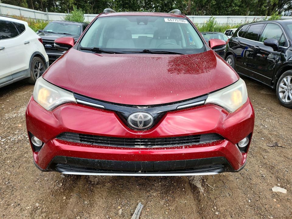 Photo 5 from auction – 2018 TOYOTA RAV4 with VIN 2T3RFREV2JW740743
