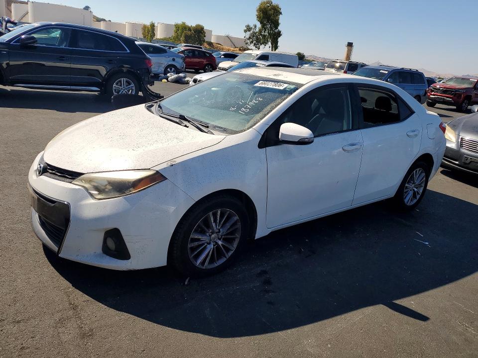 TOYOTA COROLLA 2014 with VIN 5YFBURHE7EP108100 - Photo from auction
