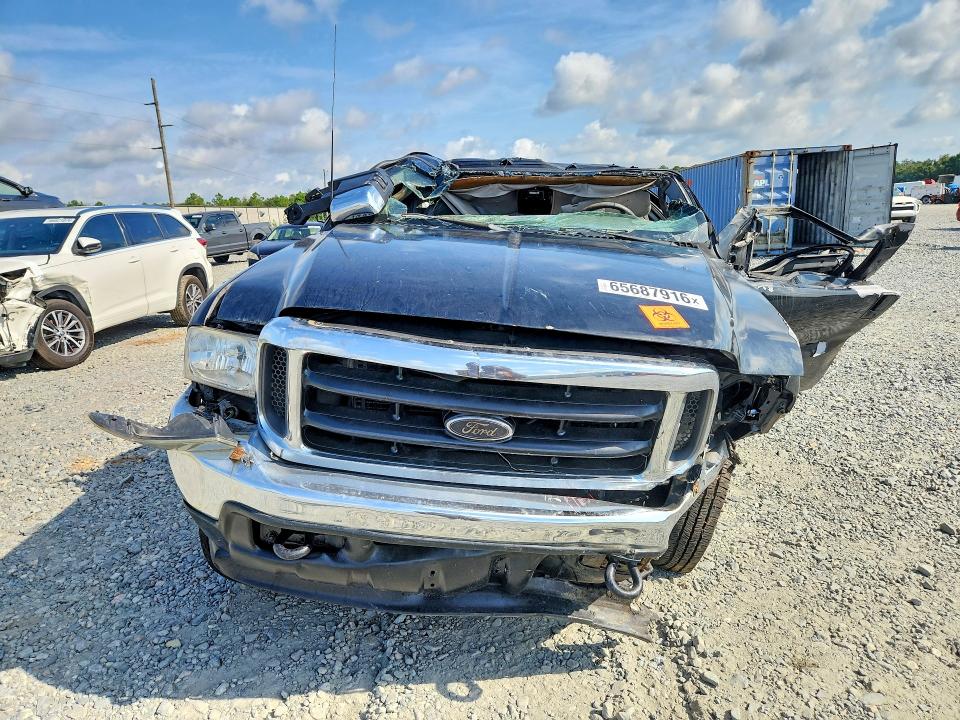 Photo 5 from auction – 2003 FORD F350 with VIN 1FTWW33F93EA76009