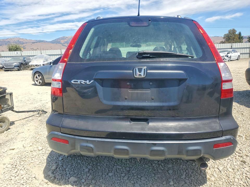 Photo 6 from auction – 2009 HONDA CR-V with VIN 5J6RE38339L025800