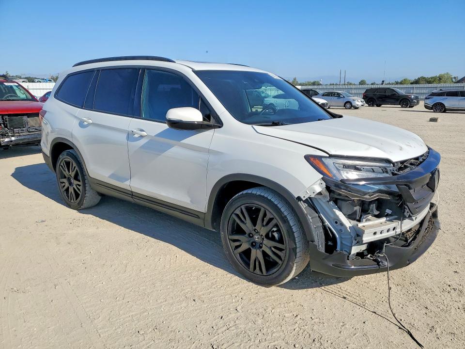 Photo 4 from auction – 2022 HONDA PILOT with VIN 5FNYF6H72NB044502