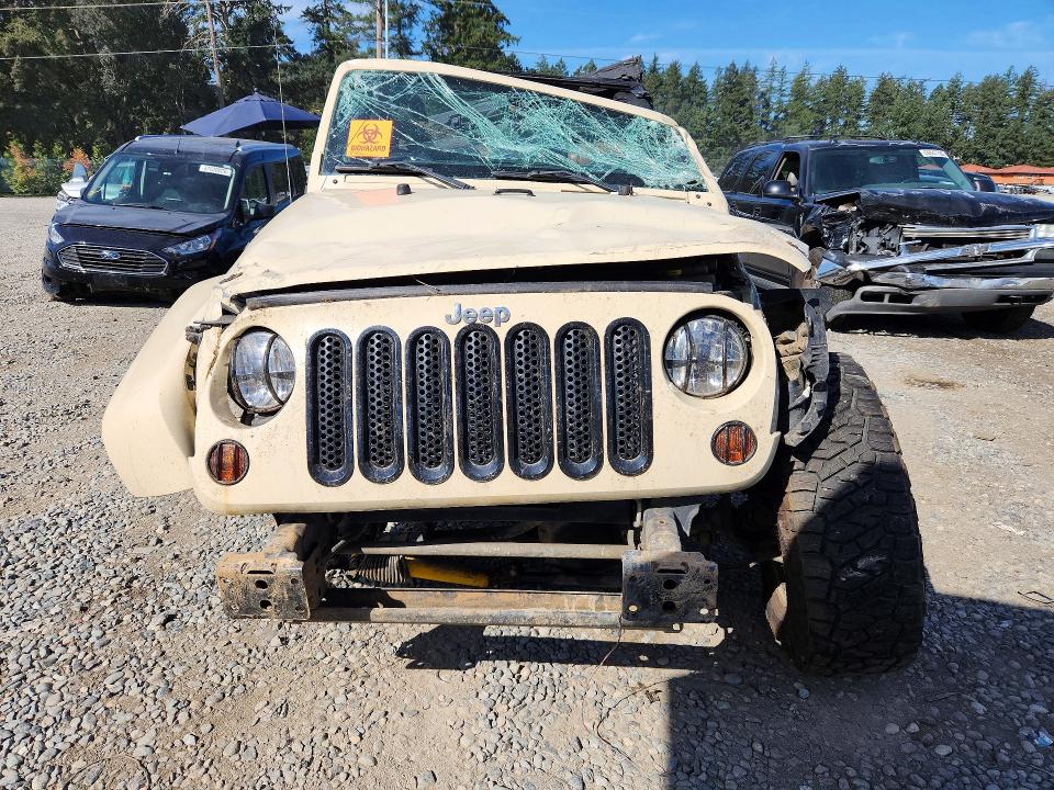 Photo 5 from auction – 2011 JEEP WRANGLER with VIN 1J4AA5D18BL566260