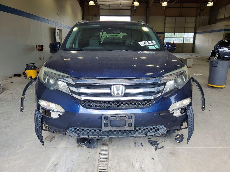 Photo 5 from auction – 2016 HONDA PILOT with VIN 5FNYF6H92GB061529