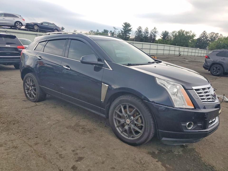 Photo 4 from auction – 2014 CADILLAC SRX with VIN 3GYFNCE31ES520380