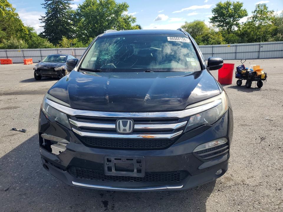 Photo 5 from auction – 2017 HONDA PILOT with VIN 5FNYF6H92HB062195
