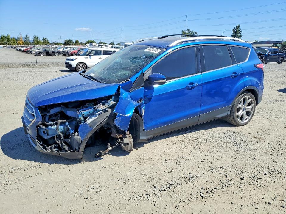 FORD ESCAPE 2017 with VIN 1FMCU9J9XHUC51899 - Photo from auction