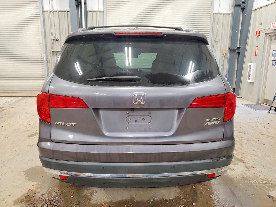 Photo 6 from auction – 2016 HONDA PILOT with VIN 5FNYF6H95GB103725