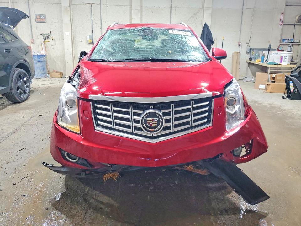 Photo 5 from auction – 2014 CADILLAC SRX with VIN 3GYFNDE39ES520472