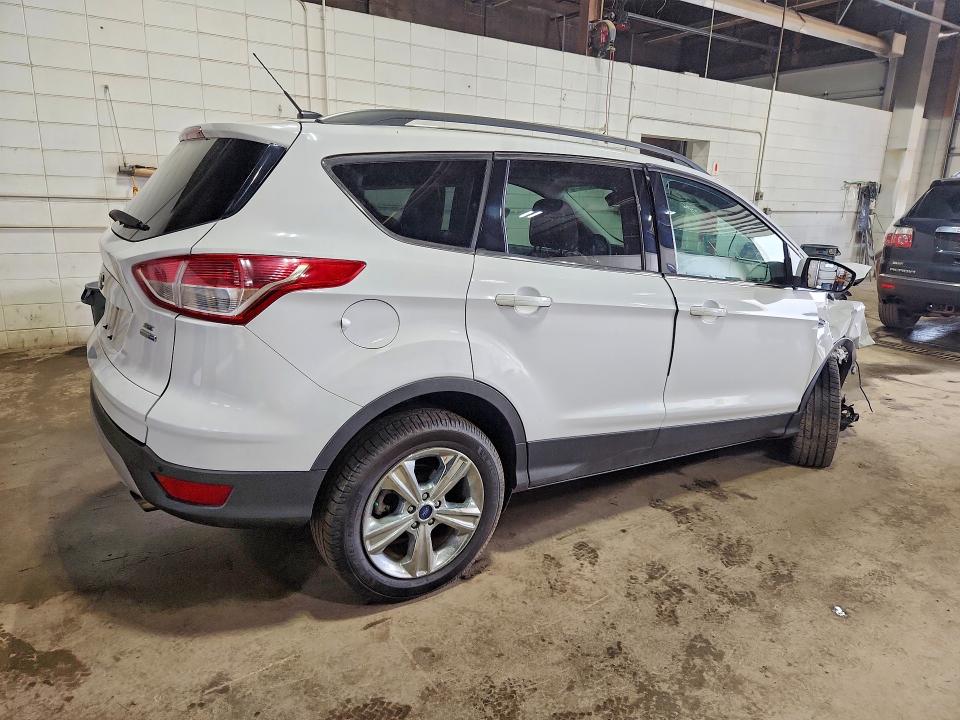 Photo 3 from auction – 2014 FORD ESCAPE with VIN 1FMCU9G90EUD59967