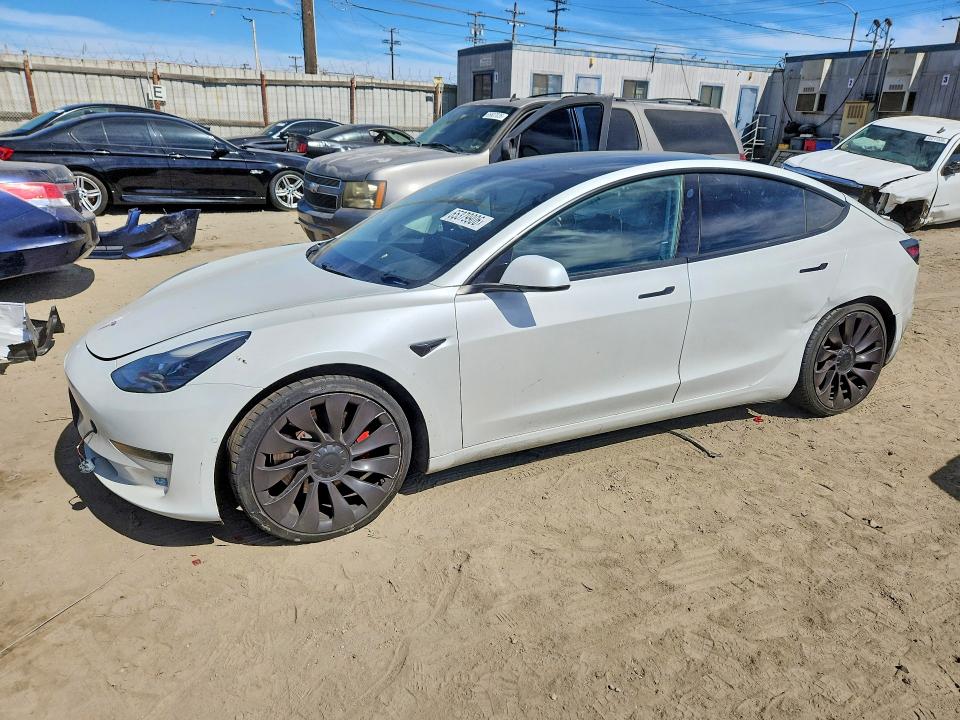 TESLA MODEL 3 2021 with VIN 5YJ3E1EC1MF935929 - Photo from auction