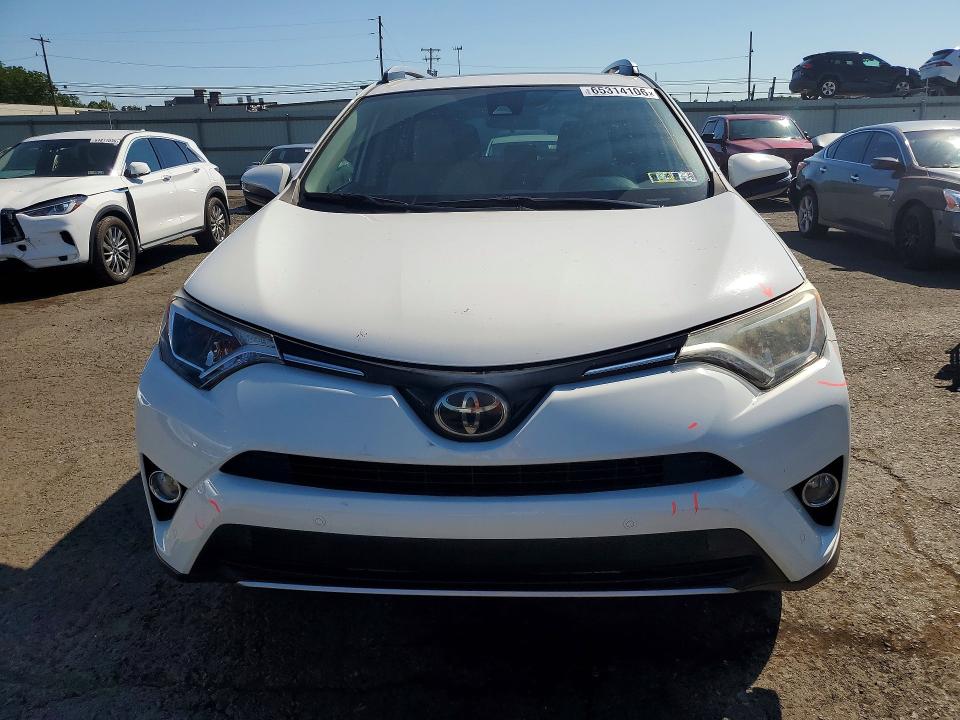 Photo 5 from auction – 2017 TOYOTA RAV4 with VIN JTMRFREVXHJ112647