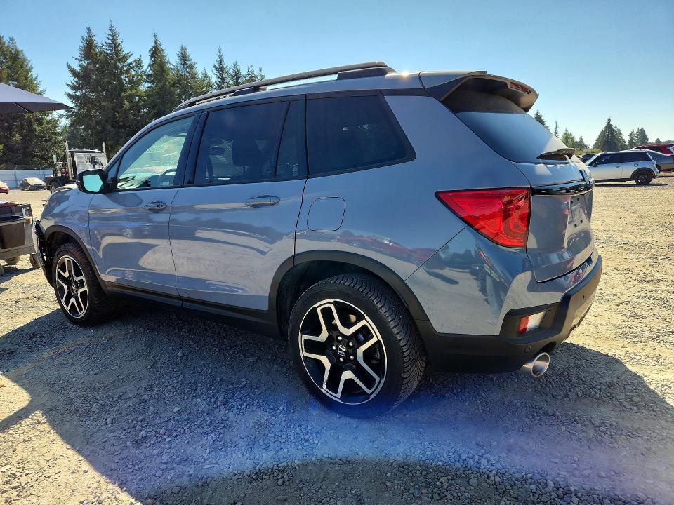 Photo 2 from auction – 2023 HONDA PASSPORT with VIN 5FNYF8H09PB023373