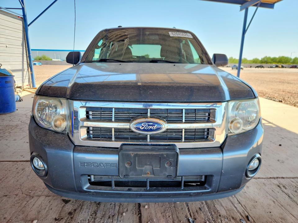 Photo 5 from auction – 2011 FORD ESCAPE with VIN 1FMCU0D72BKC40453