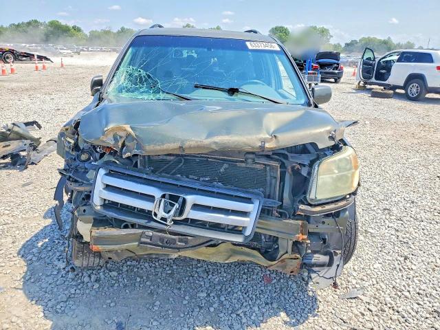 Photo 5 from auction – 2006 HONDA PILOT with VIN 2HKYF18496H507909