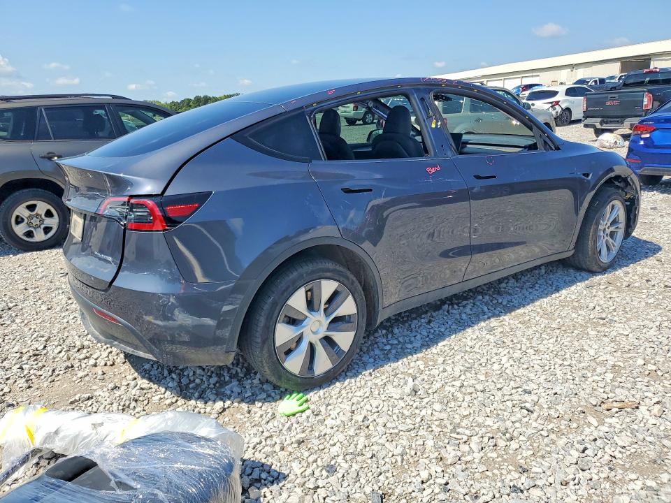Снимка 3 от търг – 2023 TESLA MODEL Y с VIN 7SAYGDEE6PF981010