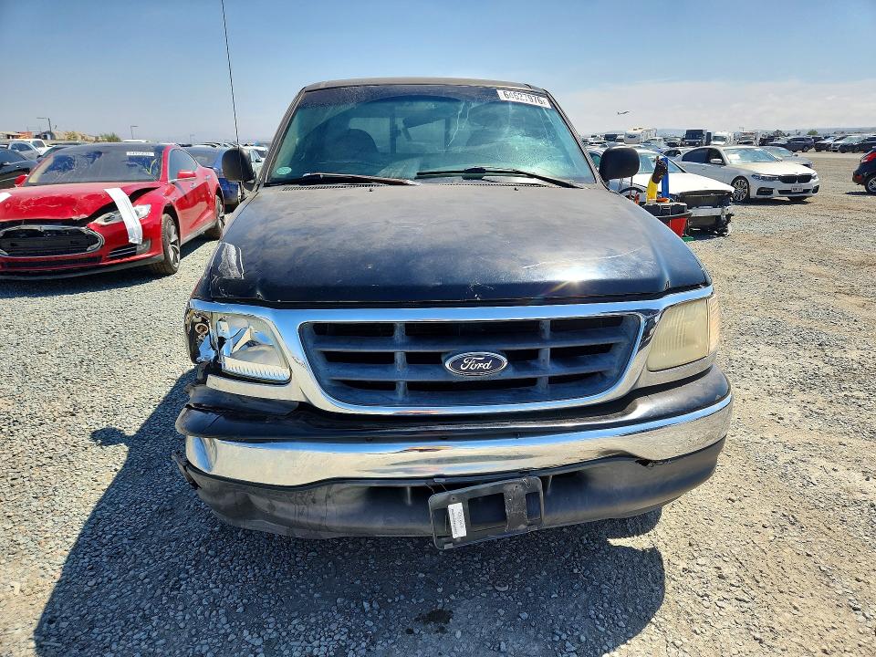 Photo 5 from auction – 2001 FORD F150 with VIN 1FTZF17221NA76004