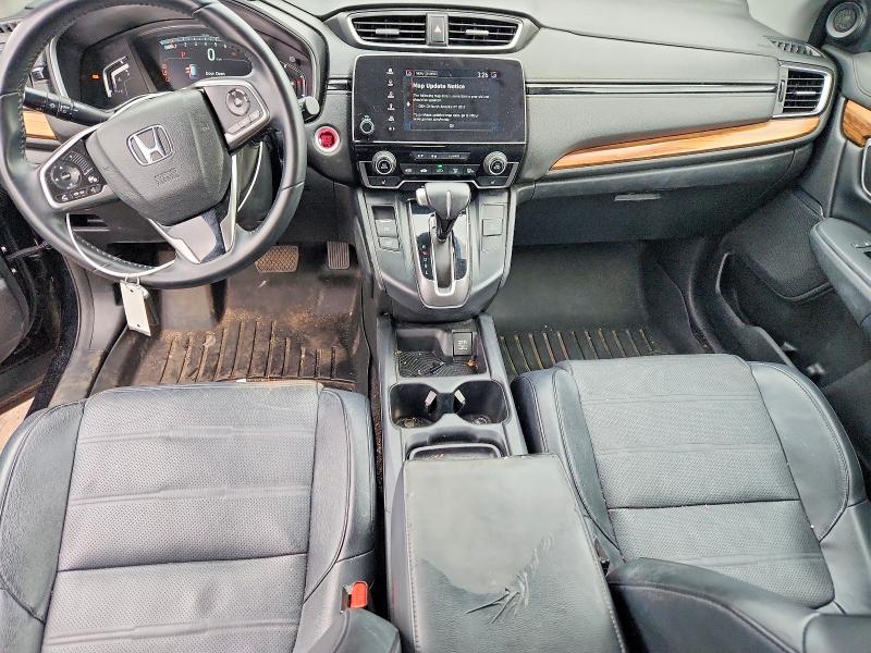 Photo 8 from auction – 2018 HONDA CR-V with VIN 7FARW2H84JE000120