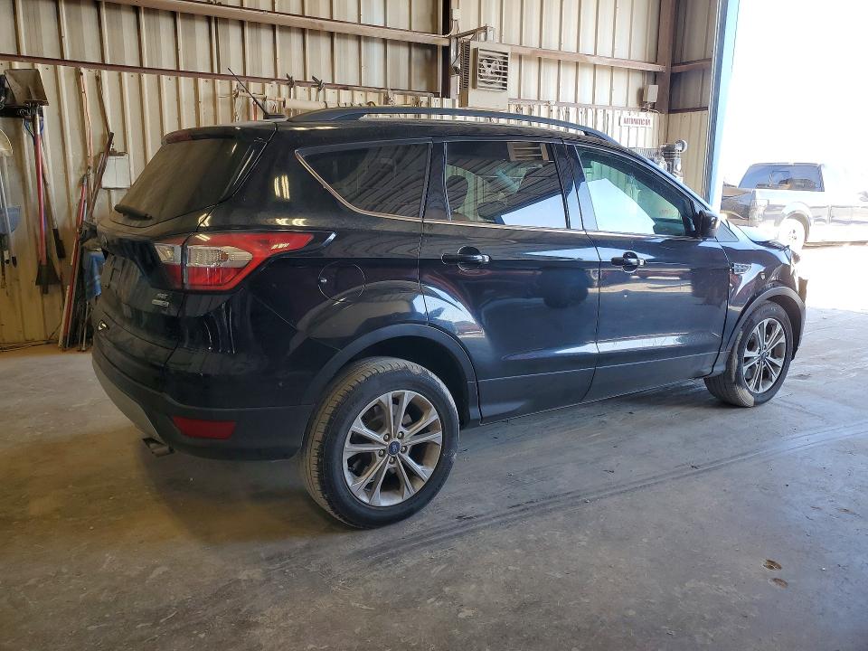 Photo 3 from auction – 2018 FORD ESCAPE with VIN 1FMCU9GD1JUC59181