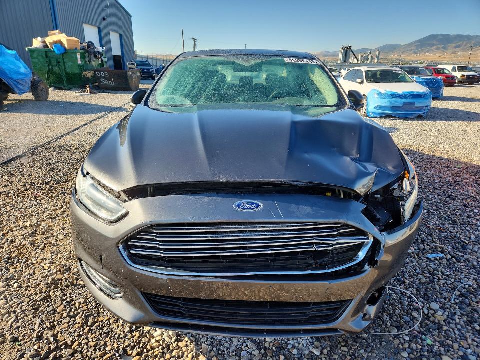 Photo 5 from auction – 2015 FORD FUSION with VIN 3FA6P0H73FR238530
