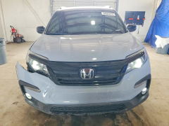 Photo 5 from auction – 2022 HONDA PILOT with VIN 5FNYF6H86NB072473