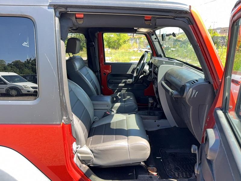 Photo 5 from auction – 2009 JEEP WRANGLER with VIN 1J4FA24149L770116