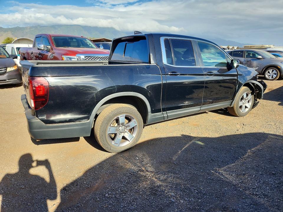 Photo 3 from auction – 2024 HONDA RIDGELINE with VIN 5FPYK3F58RB007639