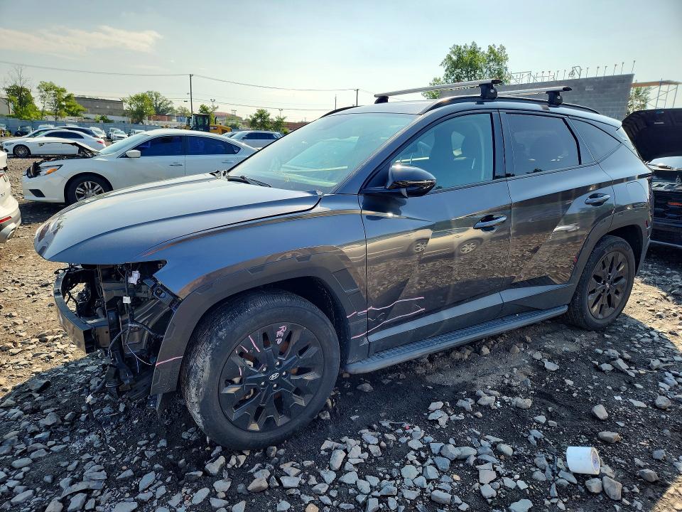 HYUNDAI TUCSON 2022 with VIN KM8JFCAE4NU165950 - Photo from auction
