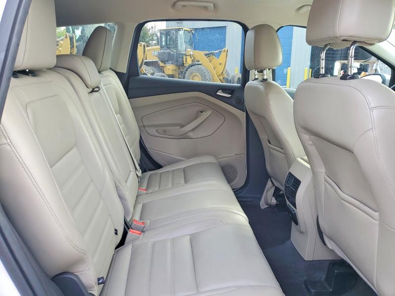 Photo 11 from auction – 2017 FORD ESCAPE with VIN 1FMCU0J92HUB81858