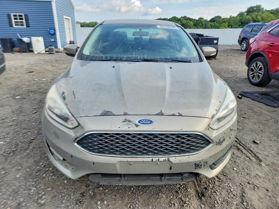 Photo 5 from auction – 2016 FORD FOCUS with VIN 1FADP3F22GL370906