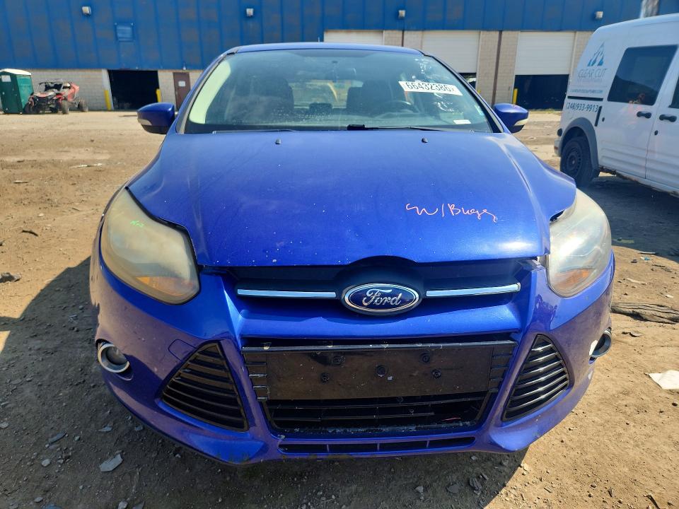 Foto 5 de la subasta – 2013 FORD FOCUS con VIN 1FADP3N2XDL327931