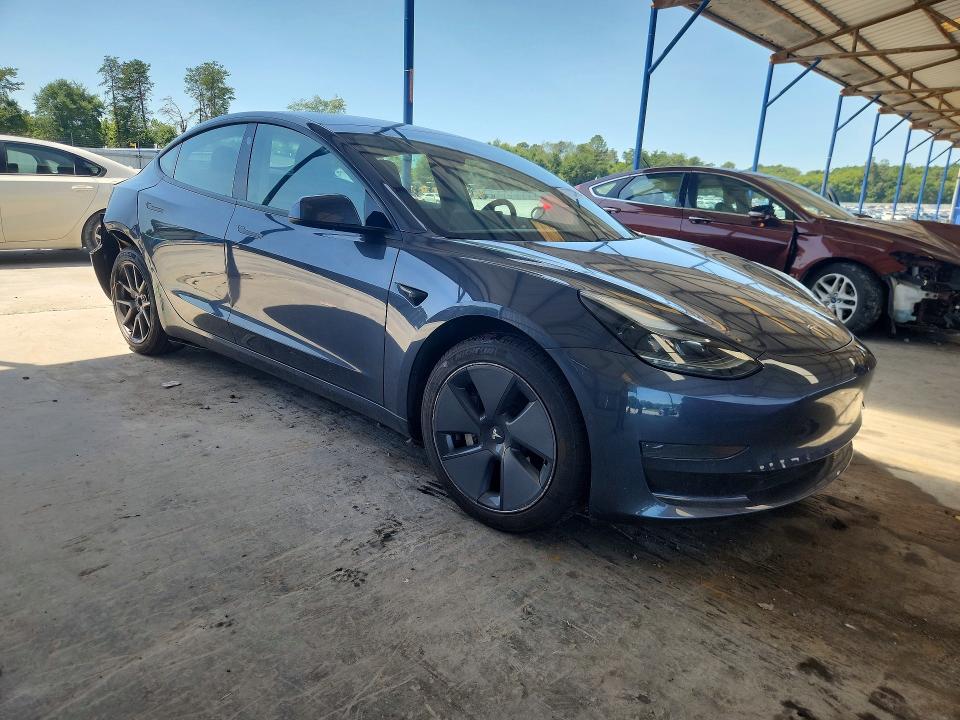 Photo 4 from auction – 2021 TESLA MODEL 3 with VIN 5YJ3E1EA6MF907266