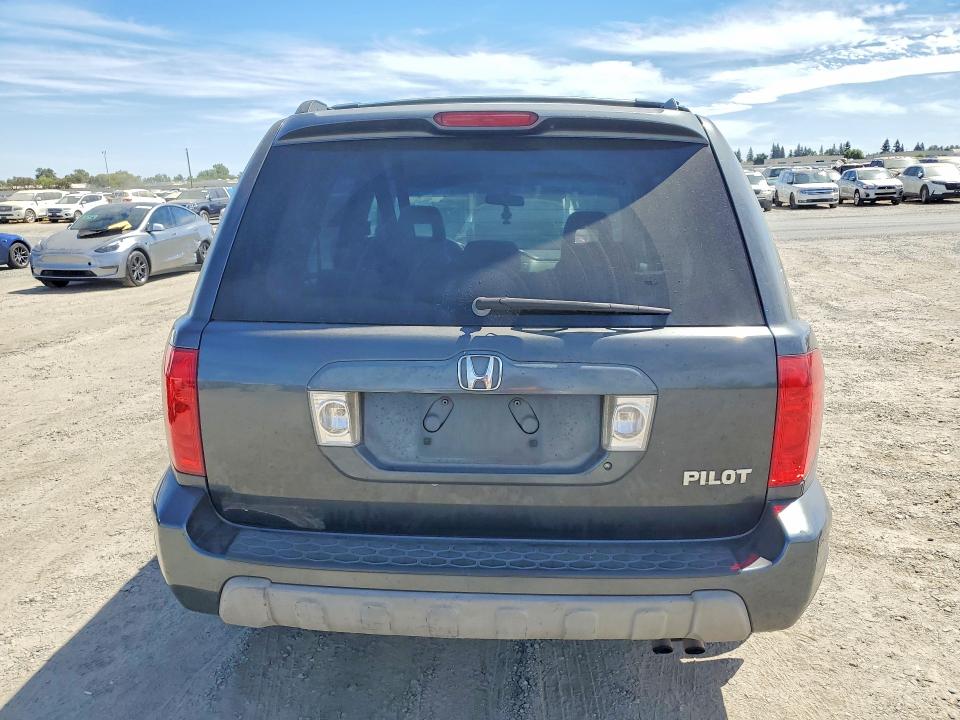 Photo 6 from auction – 2005 HONDA PILOT with VIN 2HKYF18425H571644