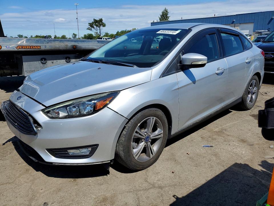 FORD FOCUS 2017 with VIN 1FADP3FEXHL257426 - Photo from auction