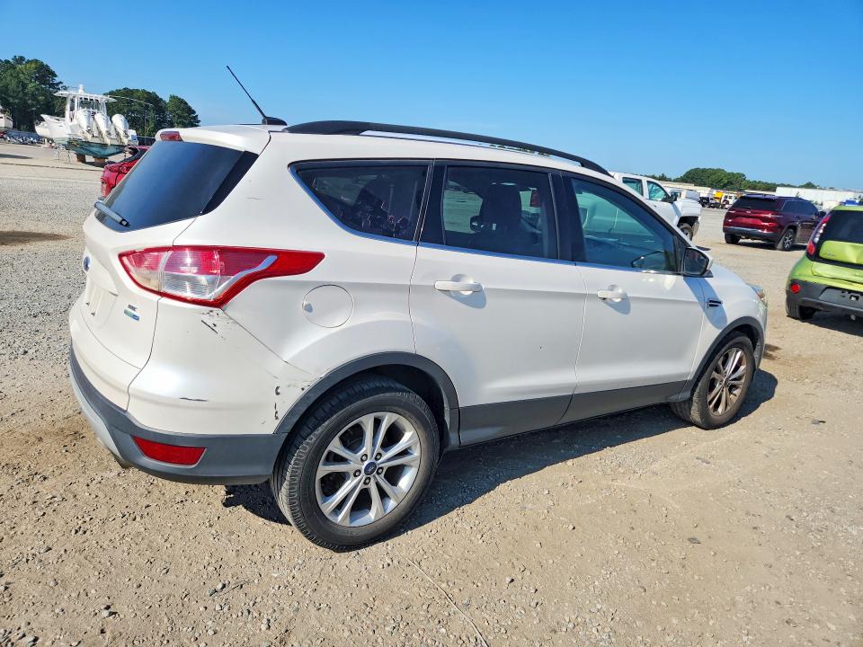 Photo 3 from auction – 2016 FORD ESCAPE with VIN 1FMCU9GX8GUA90893