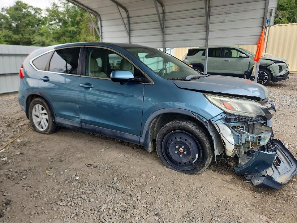 Photo 4 from auction – 2015 HONDA CR-V with VIN 2HKRM3H54FH527743