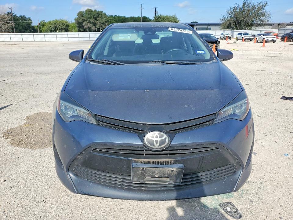 Photo 5 from auction – 2018 TOYOTA COROLLA with VIN 5YFBURHE8JP810985