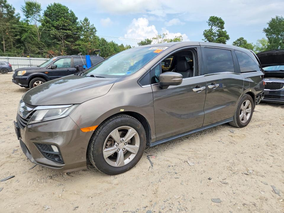 HONDA ODYSSEY 2018 with VIN 5FNRL6H74JB082983 - Photo from auction