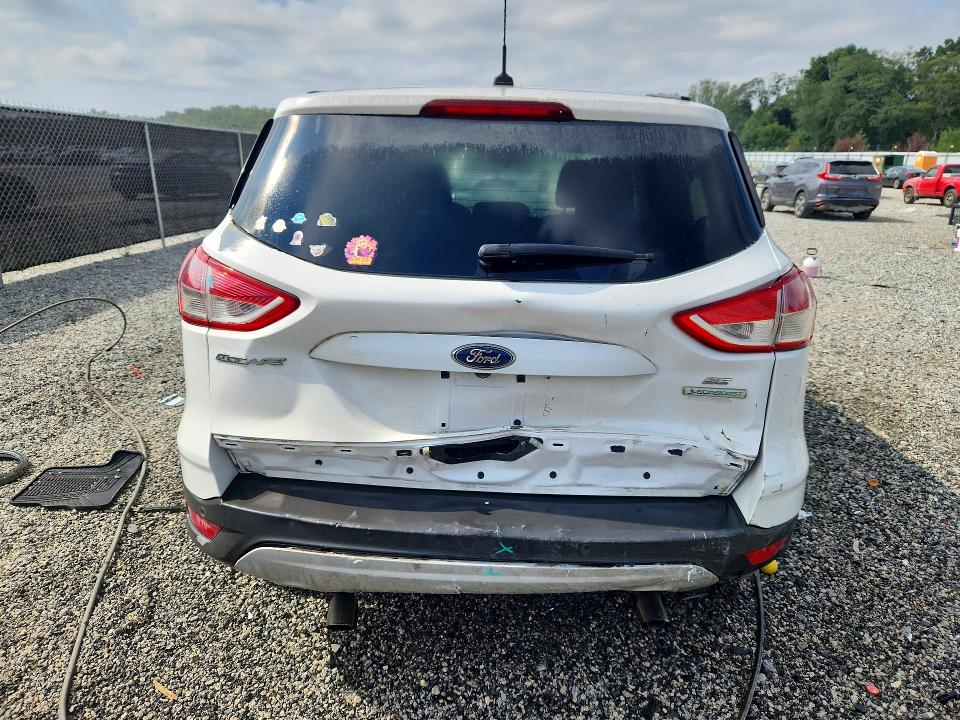 Снимка 6 от търг – 2014 FORD ESCAPE с VIN 1FMCU0G96EUD52095