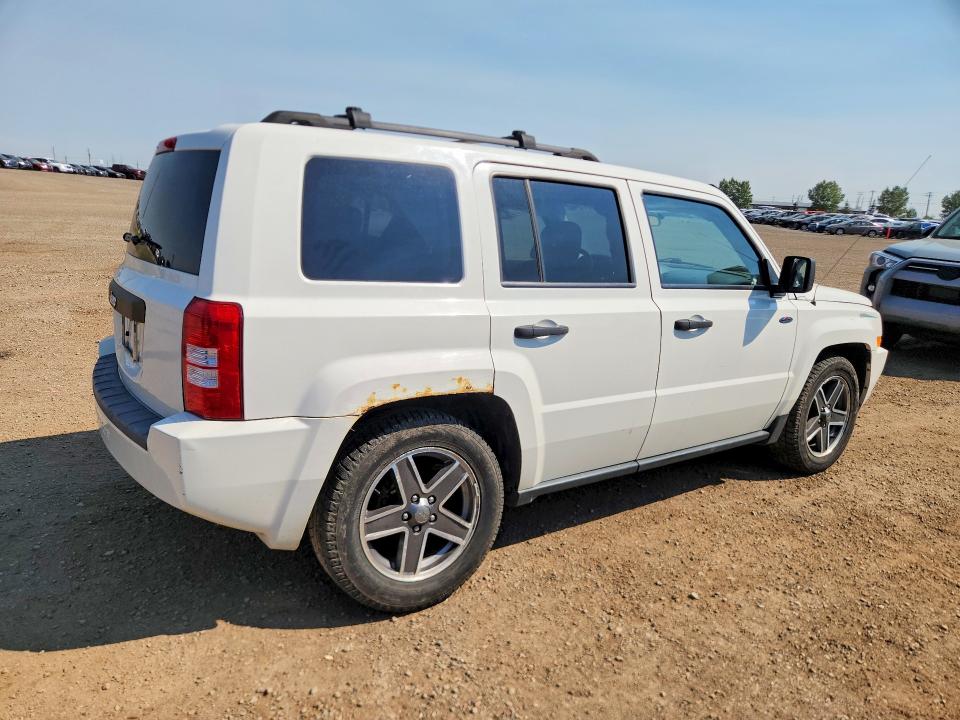 Photo 3 from auction – 2009 JEEP PATRIOT with VIN 1J4FF28B99D153325