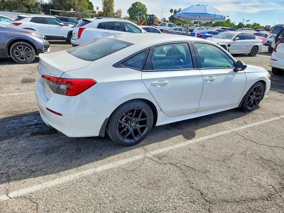Photo 3 from auction – 2022 HONDA CIVIC with VIN 2HGFE2F53NH572209