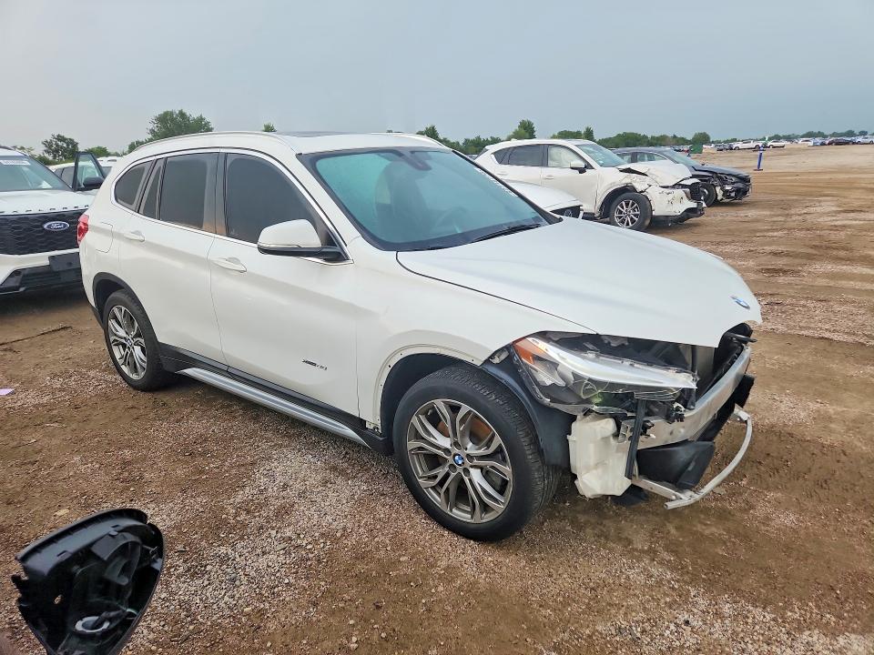 Photo 4 from auction – 2017 BMW X1 with VIN WBXHT3Z3XH4A56031