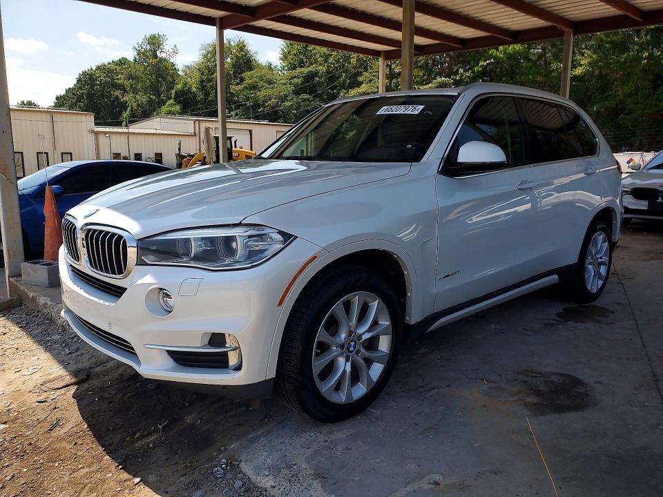 BMW X5 2014 with VIN 5UXKR2C50E0C00239 - Photo from auction