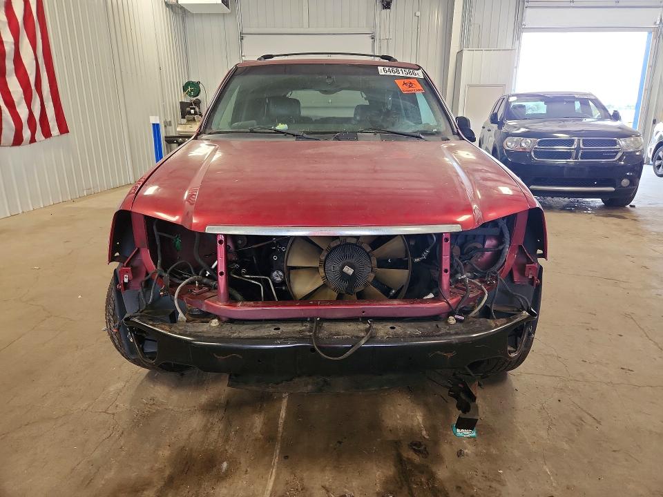 Photo 5 from auction – 2002 GMC ENVOY with VIN 1GKDT13S122350423
