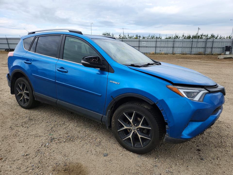 Photo 4 from auction – 2018 TOYOTA RAV4 HV with VIN JTMJJREV7JD219994