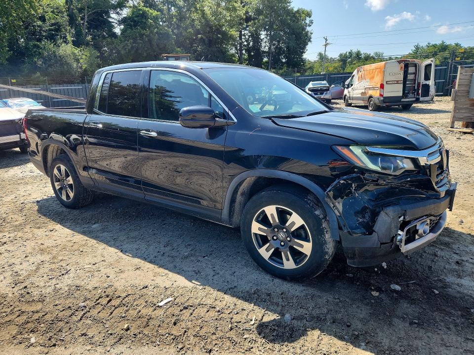 Photo 4 from auction – 2019 HONDA RIDGELINE with VIN 5FPYK3F79KB033674