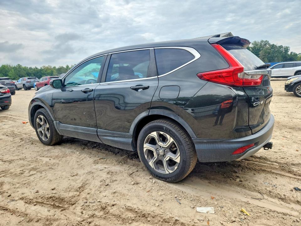 Photo 2 from auction – 2018 HONDA CR-V with VIN 7FARW2H88JE009791
