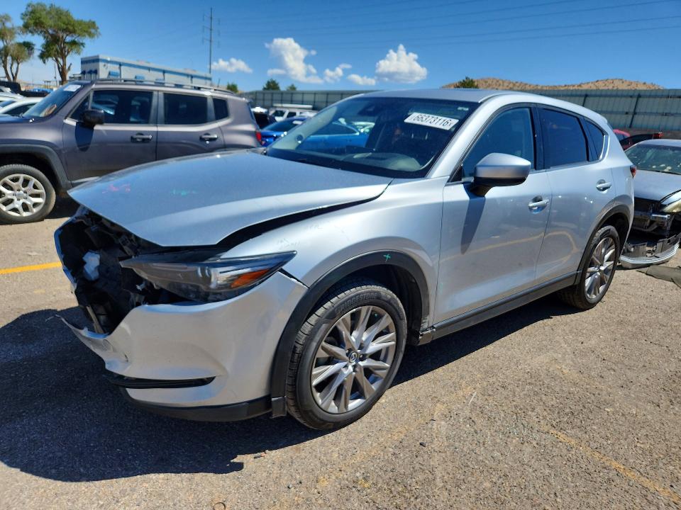 MAZDA CX-5 2021 with VIN JM3KFBAY8M0413255 - Photo from auction