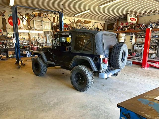 Photo 3 from auction – 2002 JEEP WRANGLER / TJ with VIN 1J4FA39S02P719959