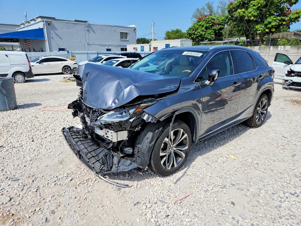 LEXUS RX 2021 with VIN 2T2HZMAA2MC211974 - Photo from auction
