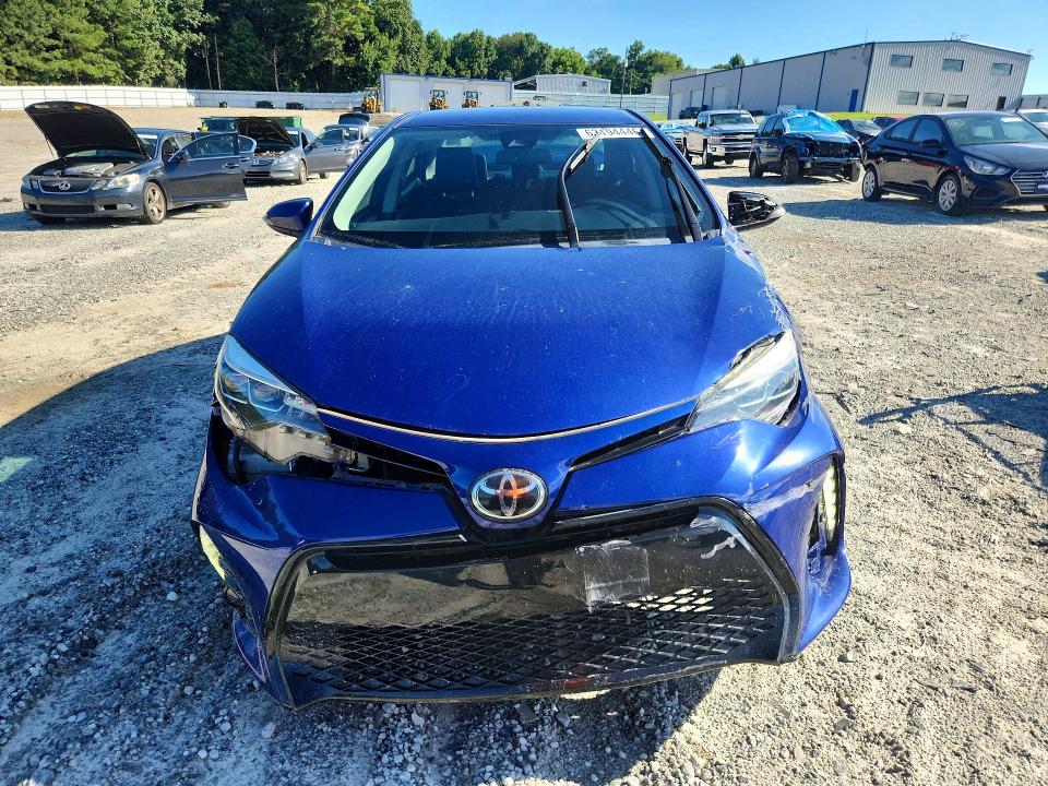 Photo 5 from auction – 2018 TOYOTA COROLLA with VIN 5YFBURHE7JP825400